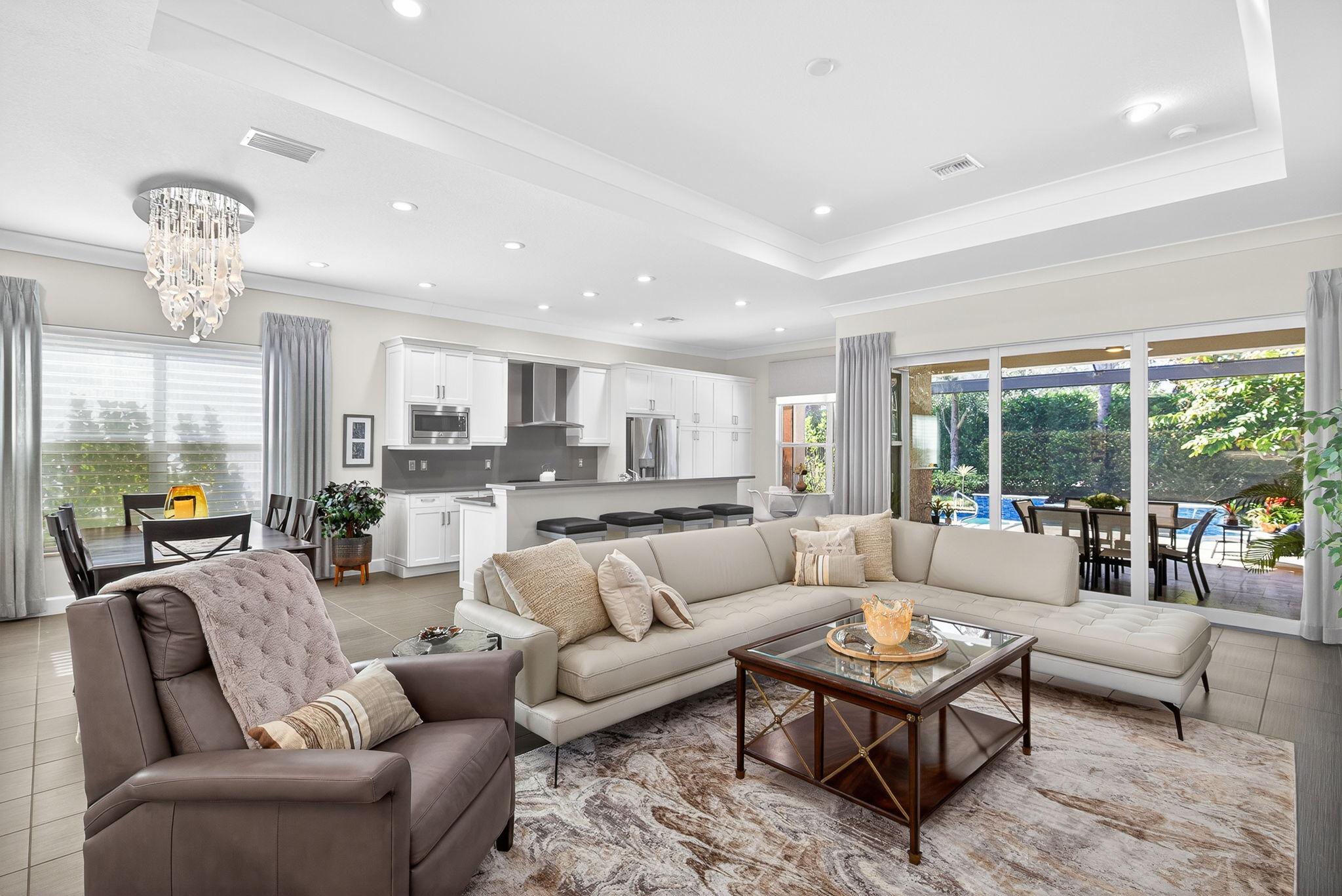 8 / 47Spacious great room comfortably seats 7 and this open floor plan will allow you to easily enjoy your family and guests in this living space that extends outside, too!..