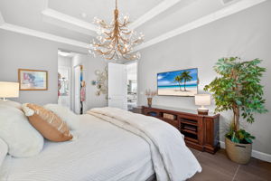 Looking into hallway with TWO walk-in closets that lead to the primary bath...
