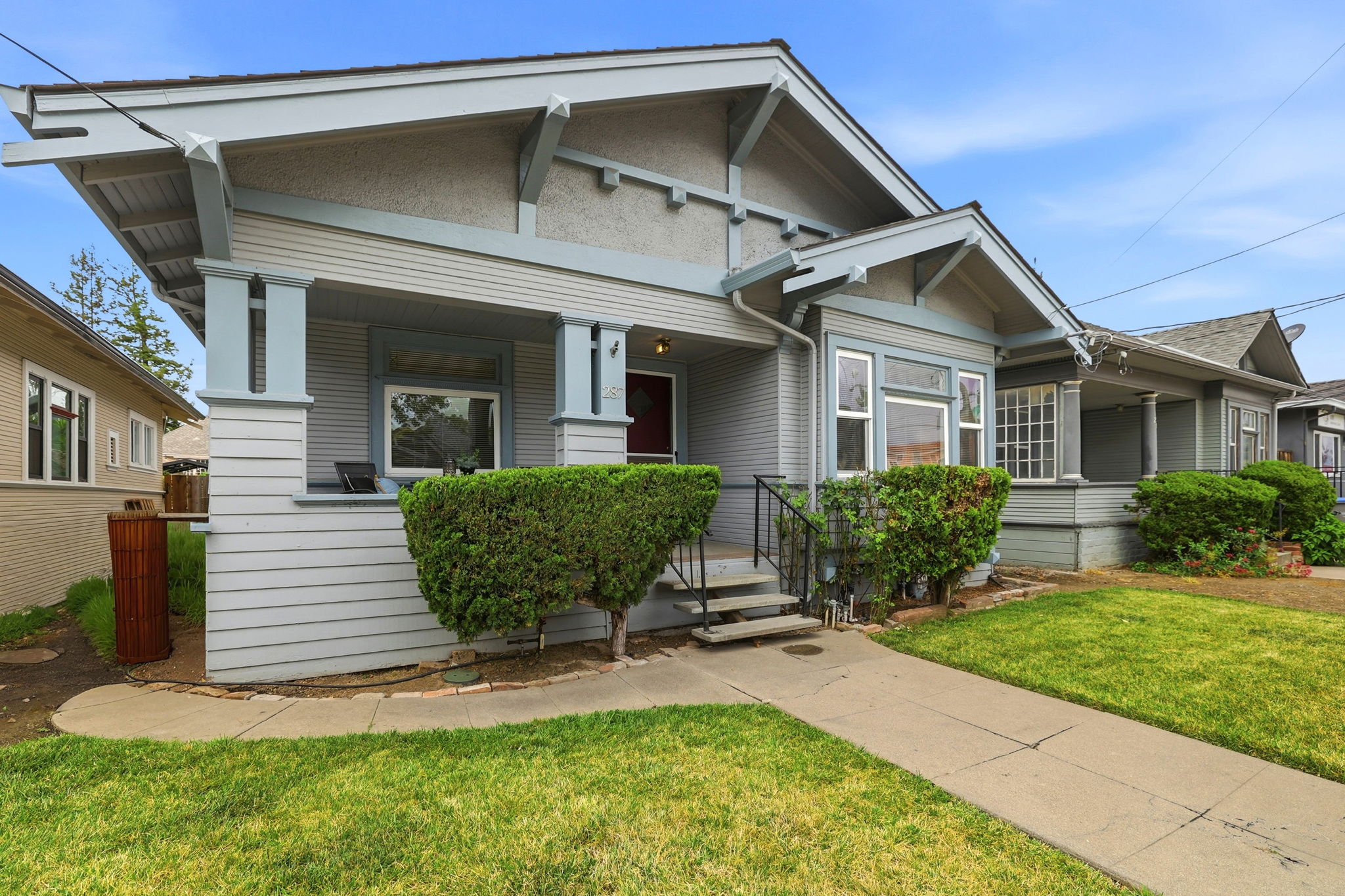Enjoy the passersby from the front porch.