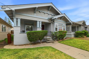 Enjoy the passersby from the front porch.