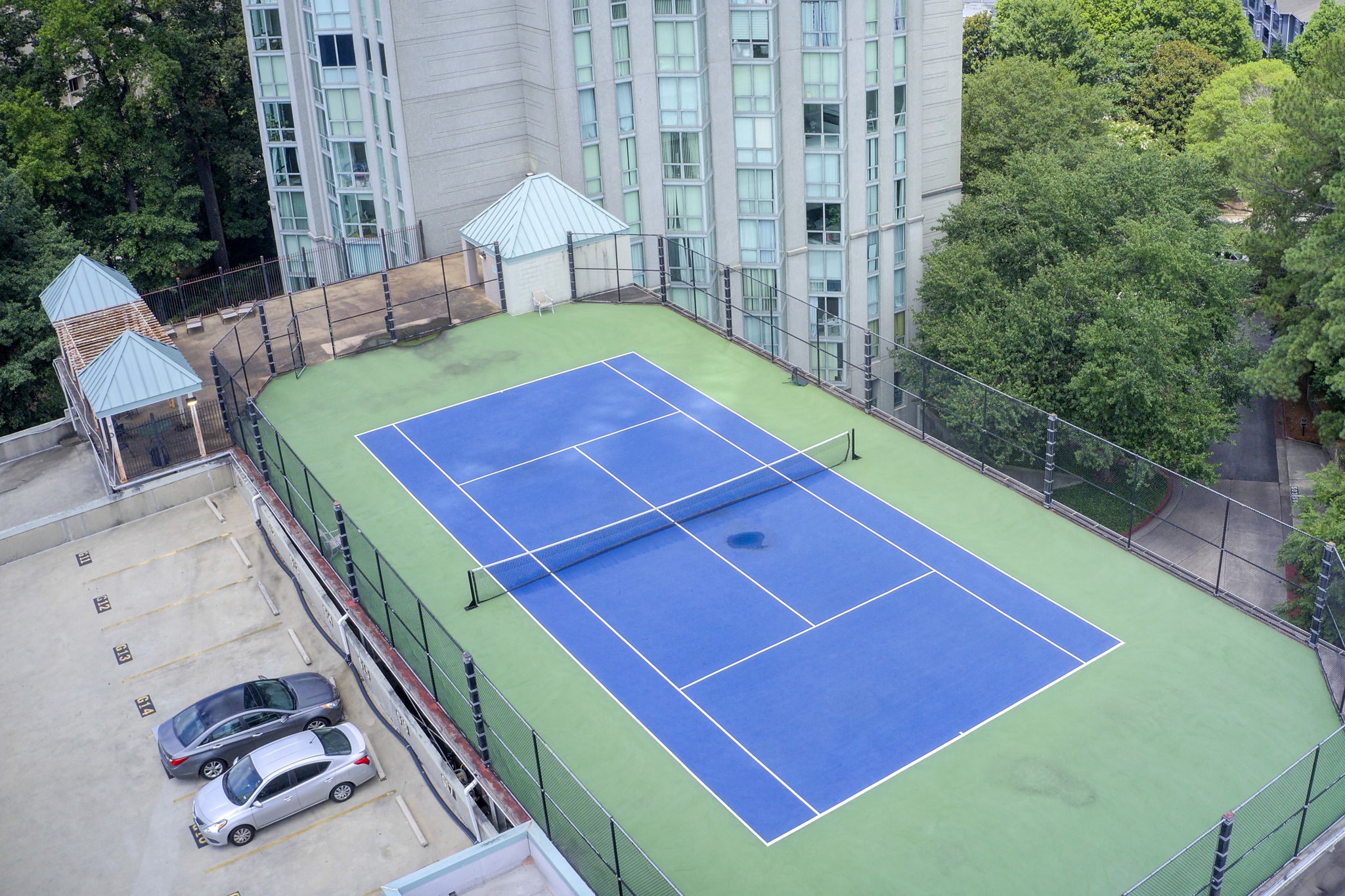 36 Aerial Tennis Courts w Building Exterior Partial