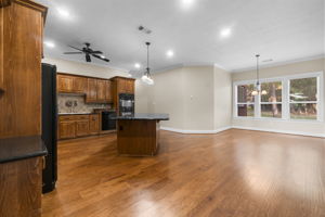 Expansive kitchen and breakfast area new hardwoods