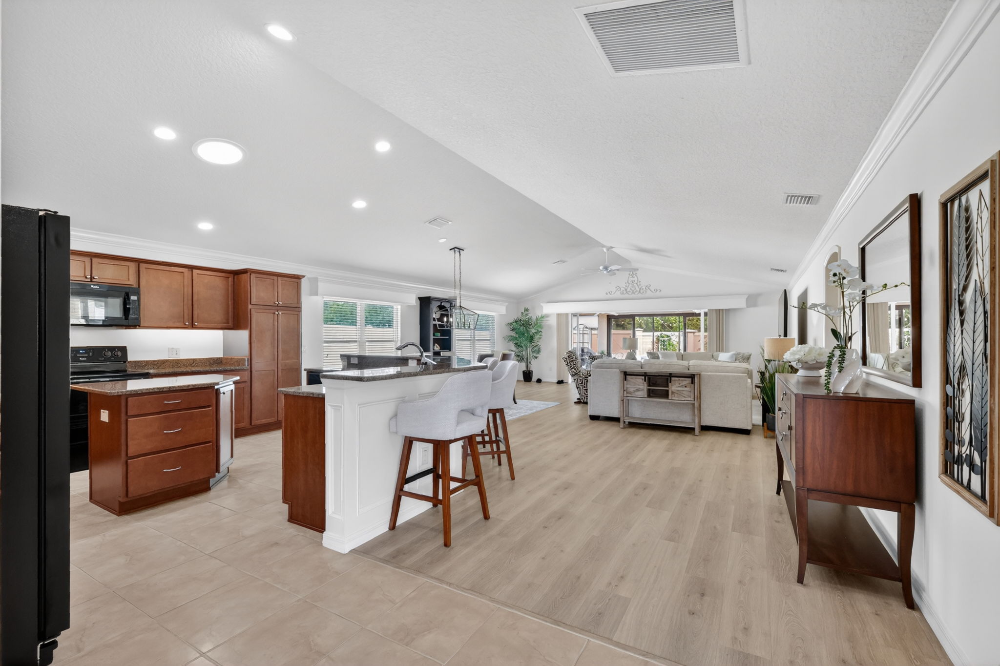 View From Foyer of Kitchen, Dining, and Living Rooms Dining