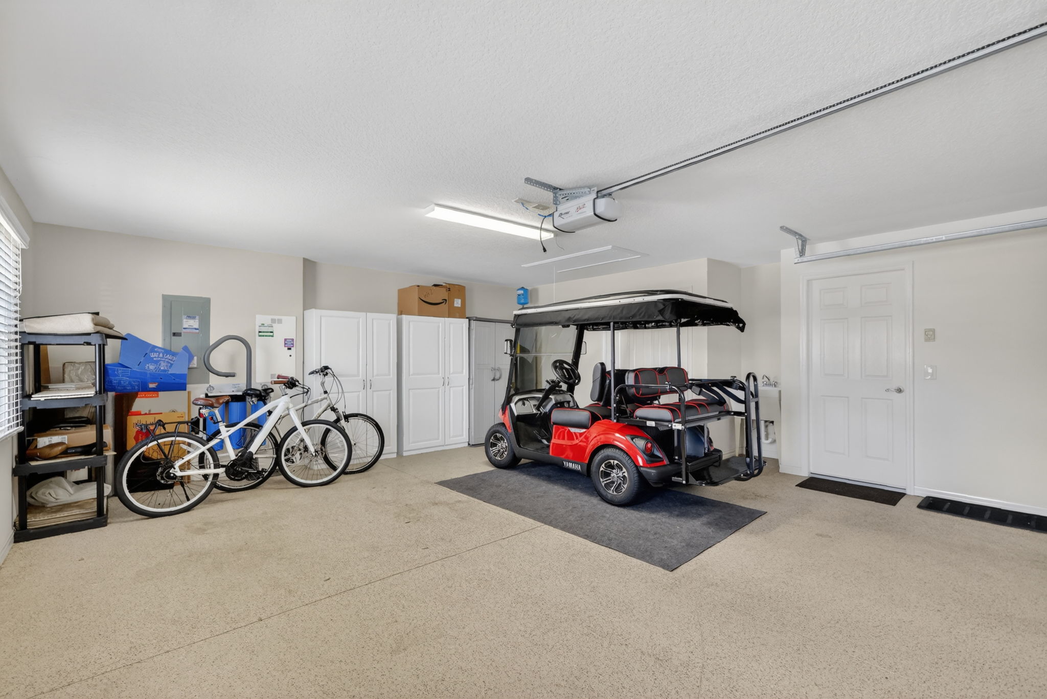 Garage with Included Yamaha Quiet Tech Drive 2 Golf Cart