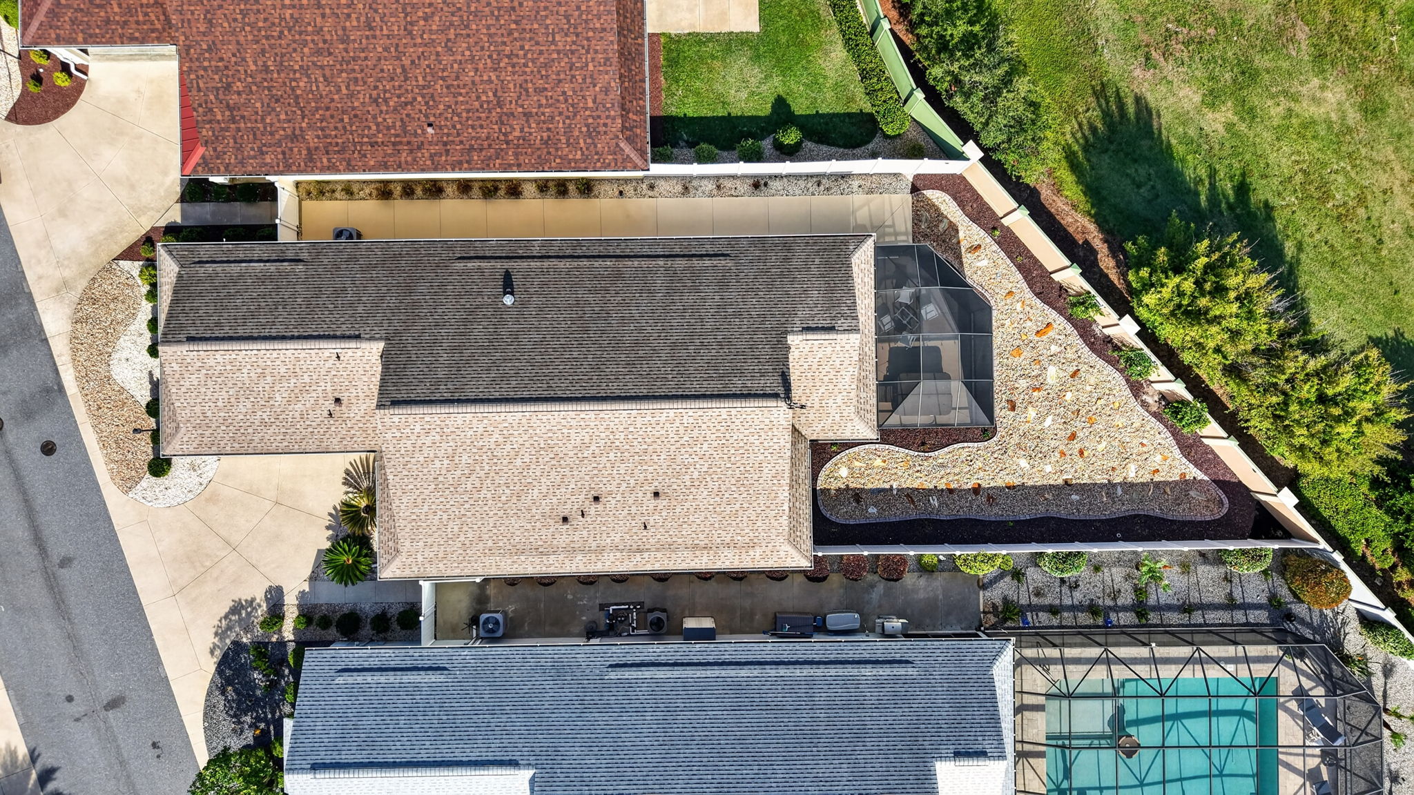 Aerial with Privacy Wall and Fencing, Stoned Landscaping, and ROOM FOR A POOL!
