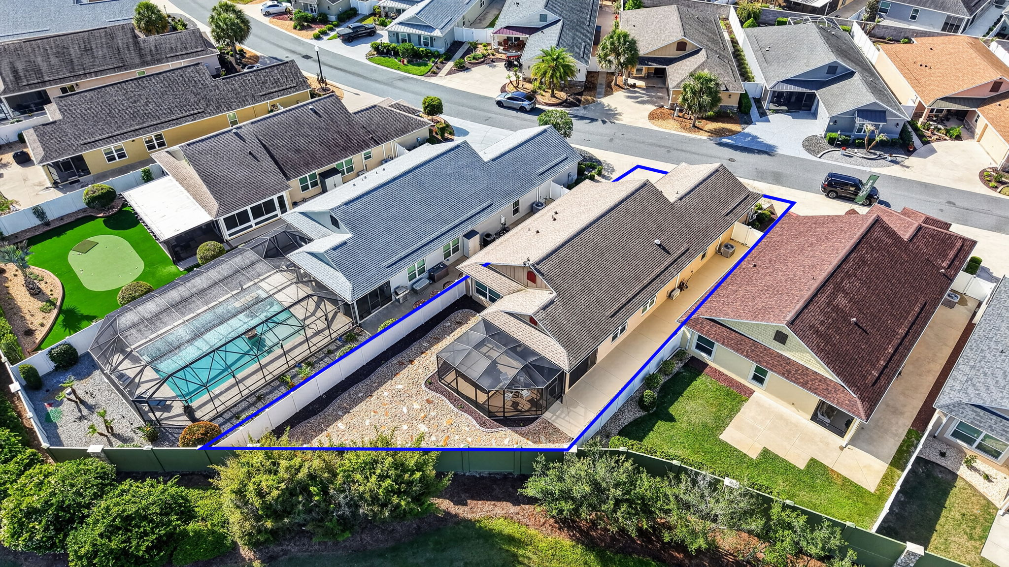 Aerial with Property Lines, Privacy Wall and Fencing, Stoned Landscaping, and ROOM FOR A POOL!