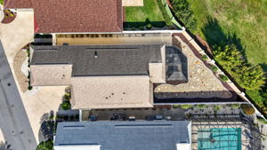 Aerial with Privacy Wall and Fencing, Stoned Landscaping, and ROOM FOR A POOL!