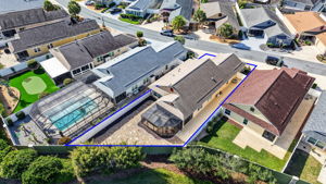 Aerial with Property Lines, Privacy Wall and Fencing, Stoned Landscaping, and ROOM FOR A POOL!