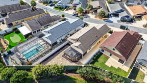 Aerial with Privacy Wall and Fencing, Stoned Landscaping, and ROOM FOR A POOL!