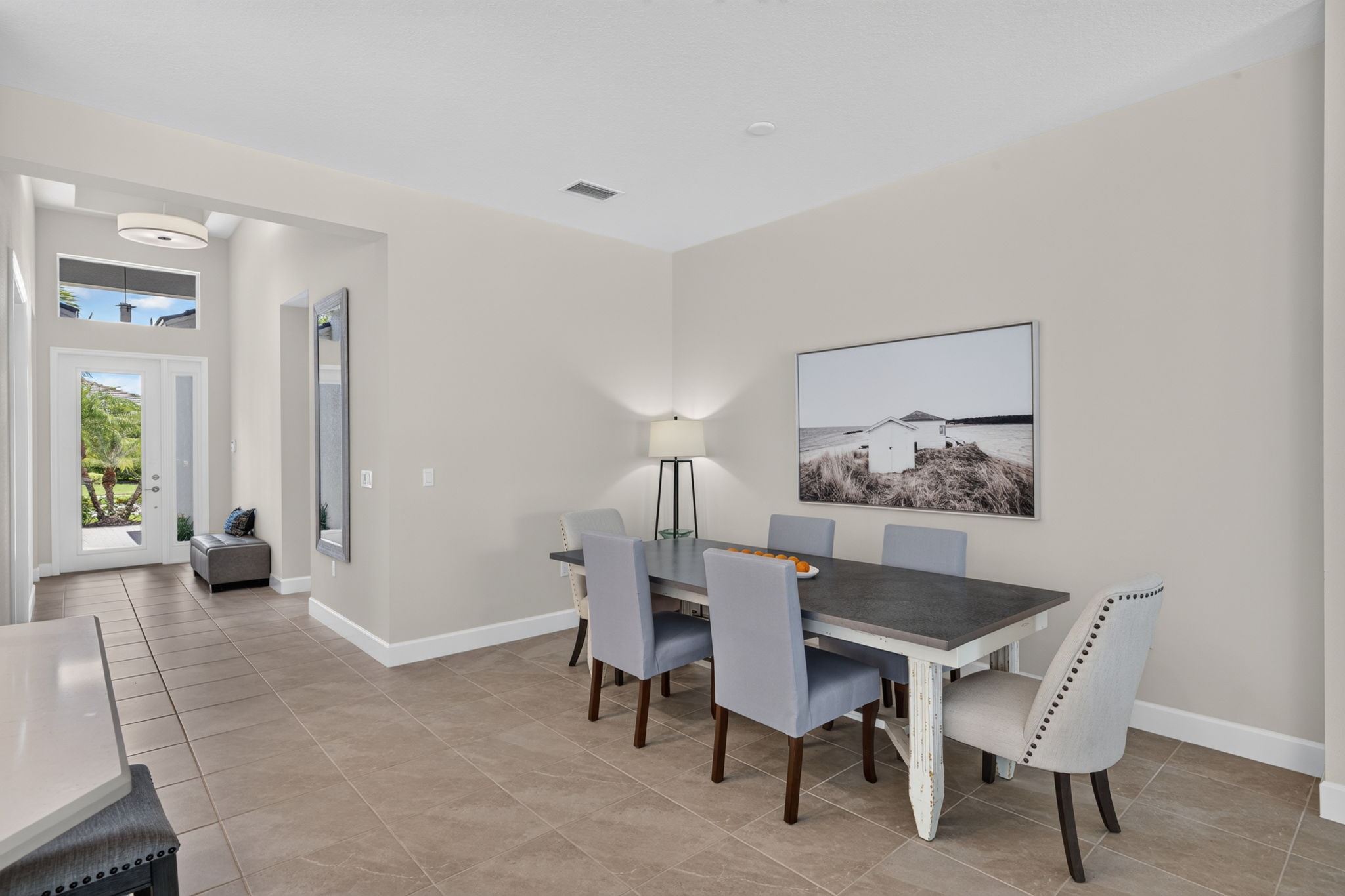 View from breakfast nook into dining area and foyer...