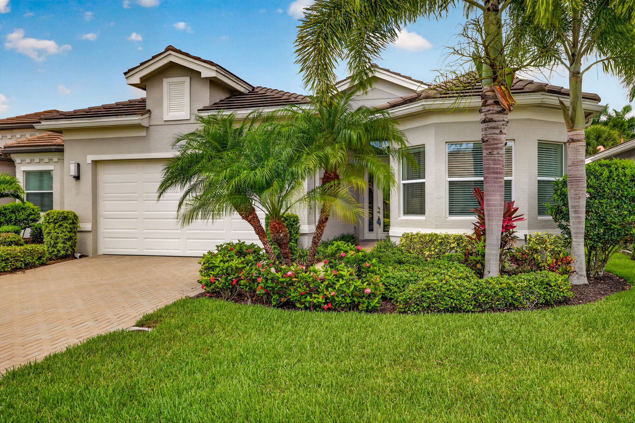 Beautiful front landscaping will impress your guests upon arrival to your new home!