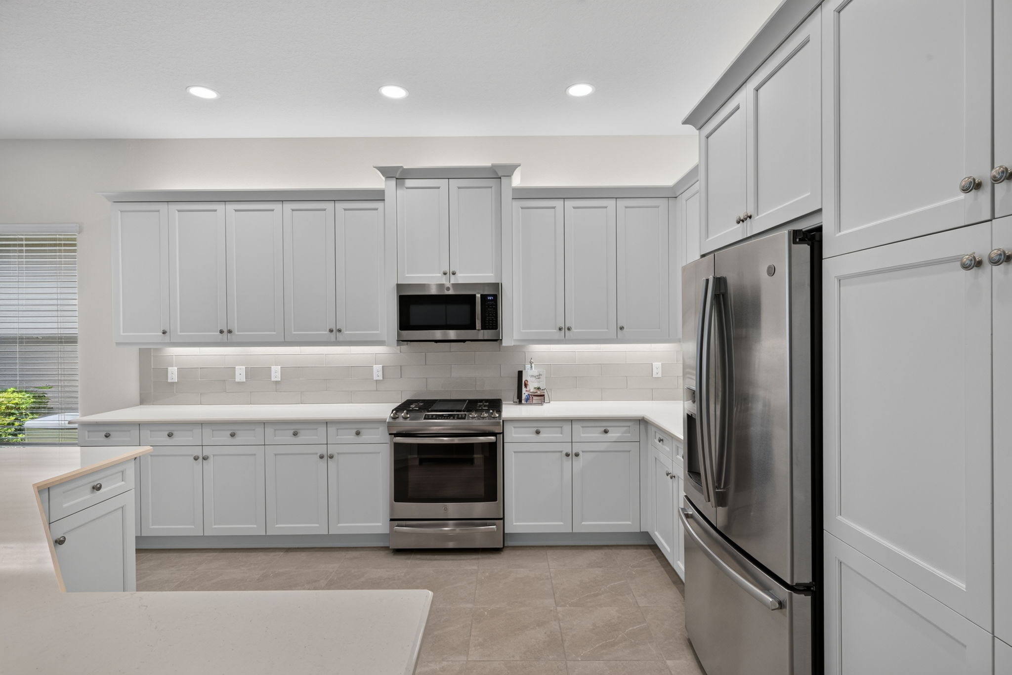 PLENTY of cabinet and countertop work space... a cook's dream! Did I mention gas cooking present here?