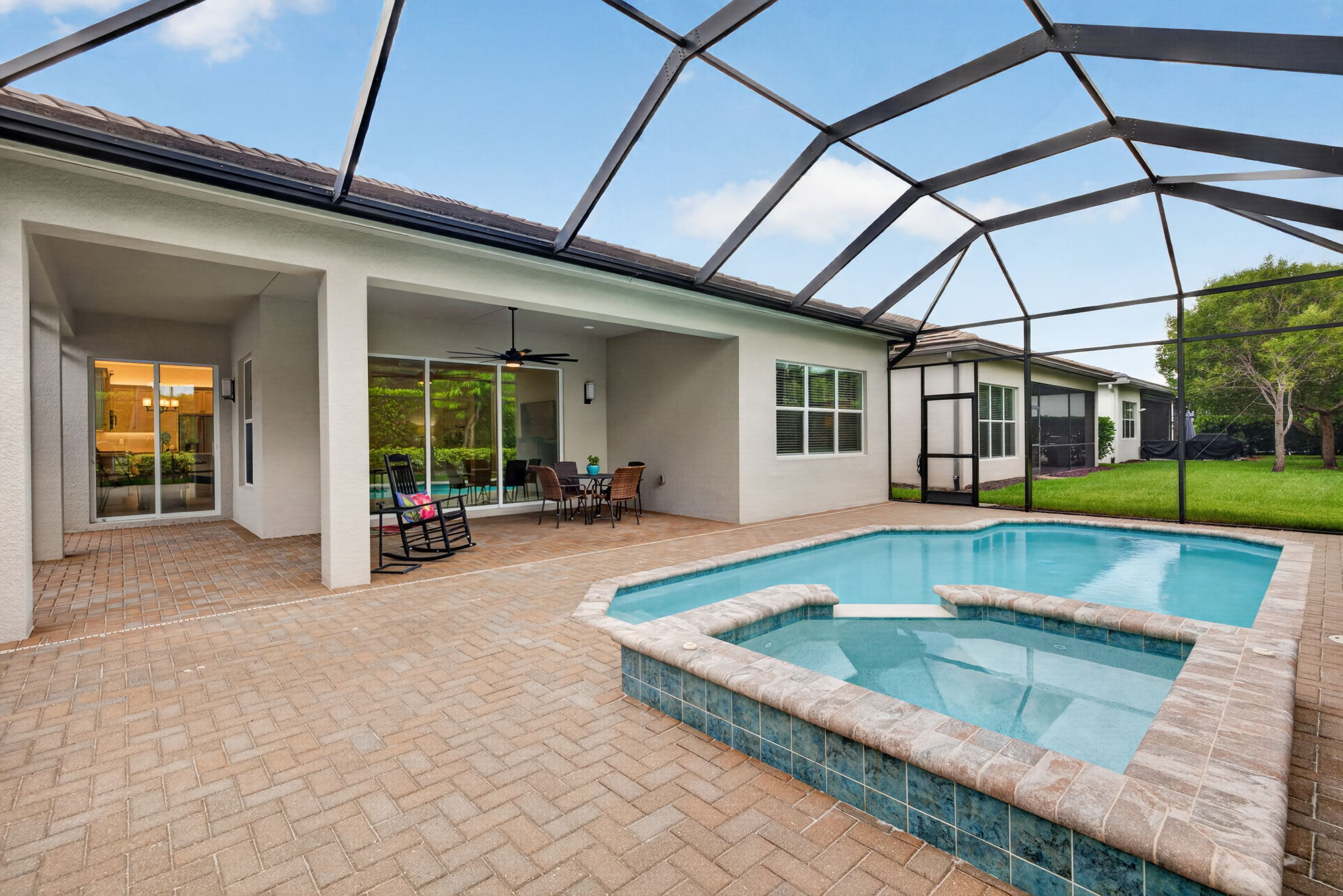 Attached hot tub adds even more fun to the pool experience! Enjoy!
