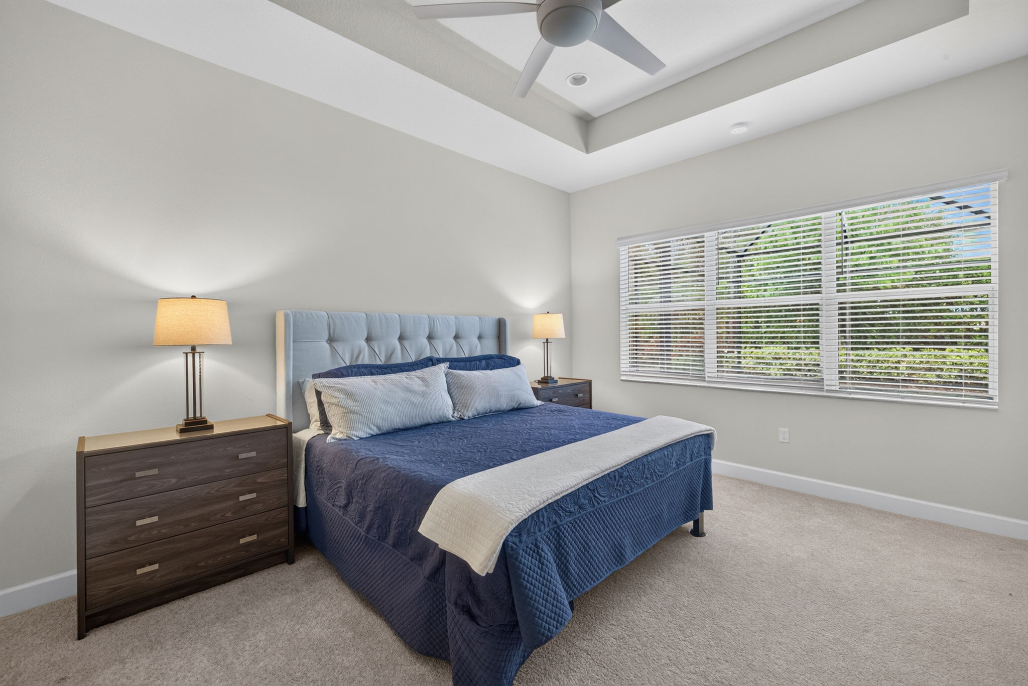Recently replaced carpeting, 3 windows overlooking the pool area and space for any sized bedroom furniture AND a chair! 2 walk-in closets are present, too!