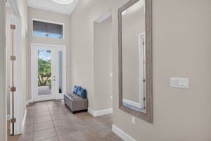 Glass front with side panel allows more natural light to enter your home! Welcome in to your new home!