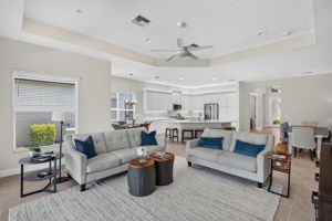 View from pool sliders into the living areas in rear of home of great rm, dining area, breakfast rm, and kitchen! Very popular floor plan!