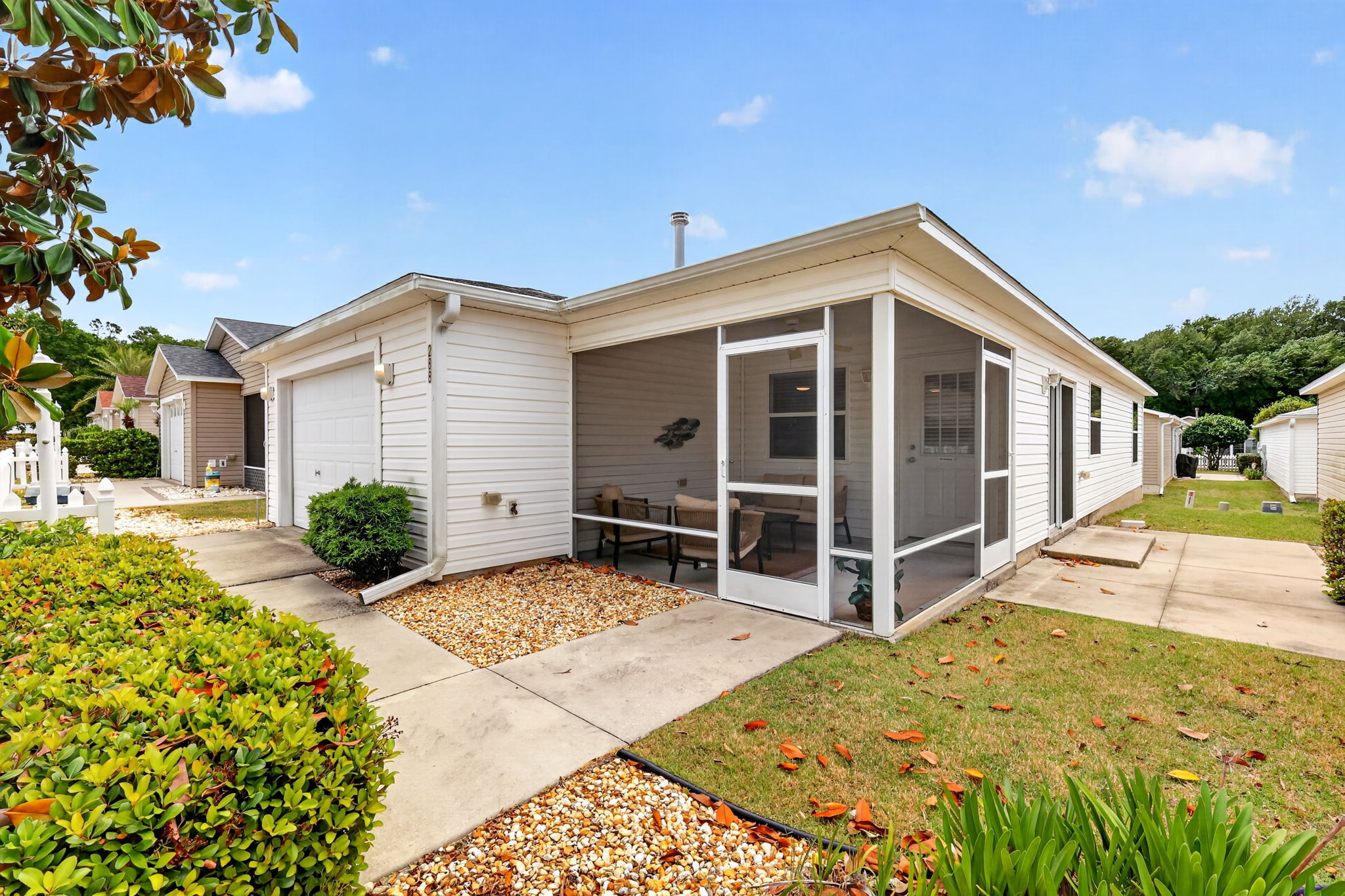 Front Elevation with Side Patio
