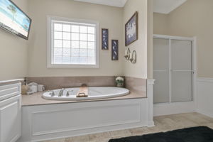 Primary Soaking Tub & Private Shower