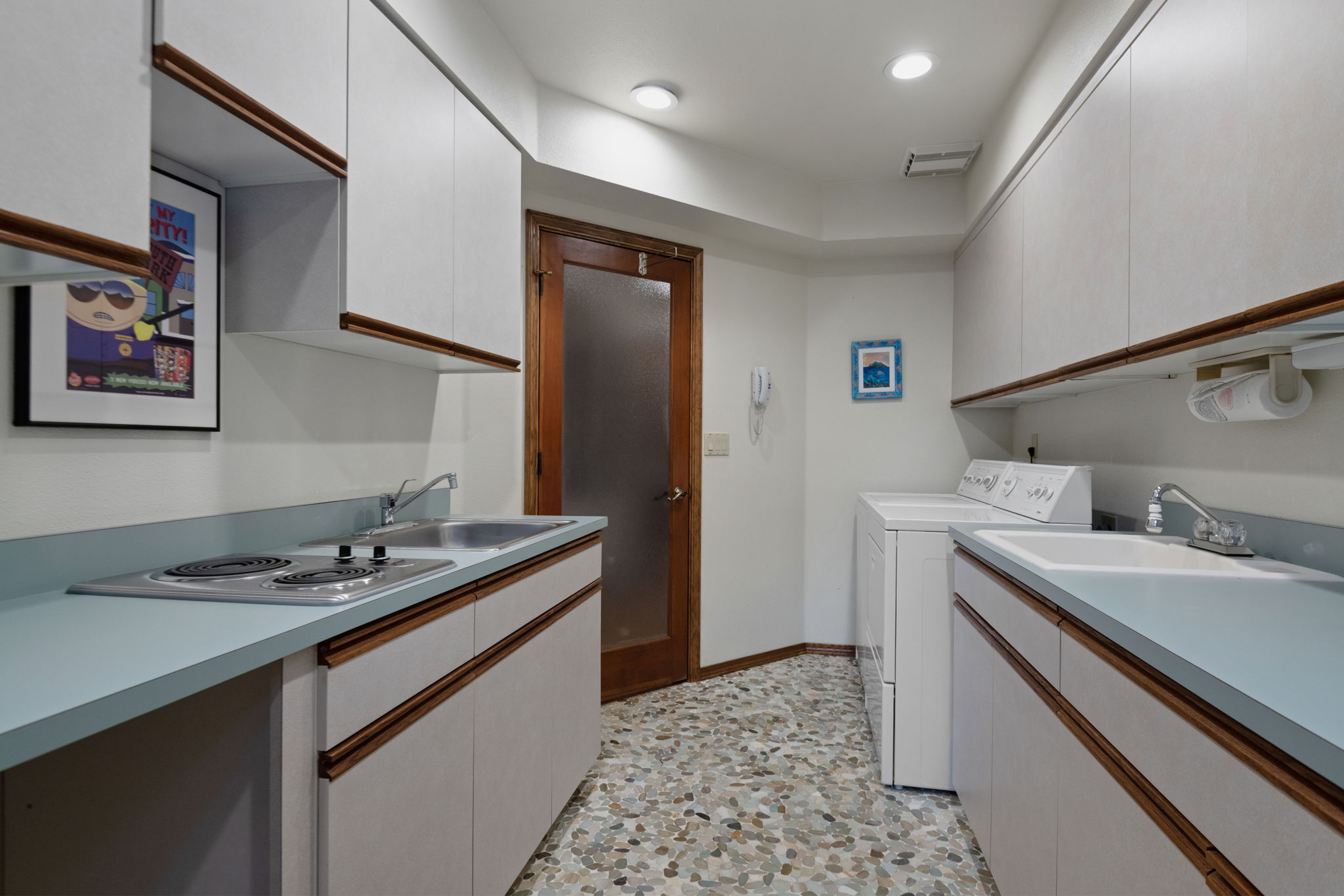 Laundry room doubles as a mini kitchen