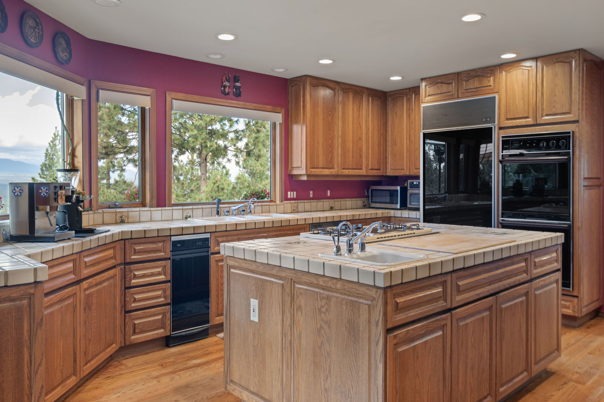 Quality custom tile work with built-in cutting board in the kitchen