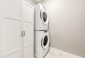 Additional storage in the laundry room. Washer & dryer stay!