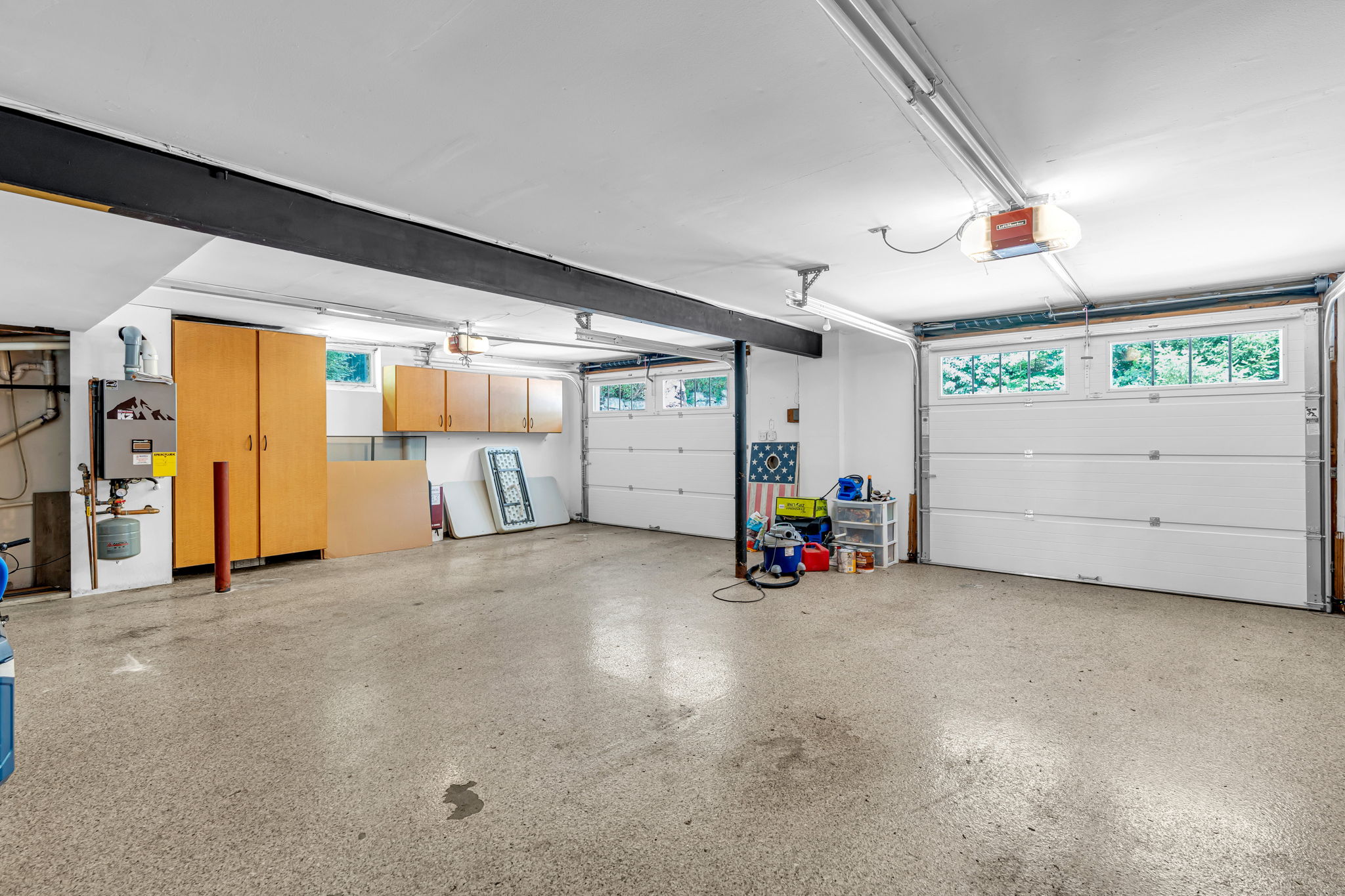 Built-in finished garage, insulated overhead garage door, key less entry