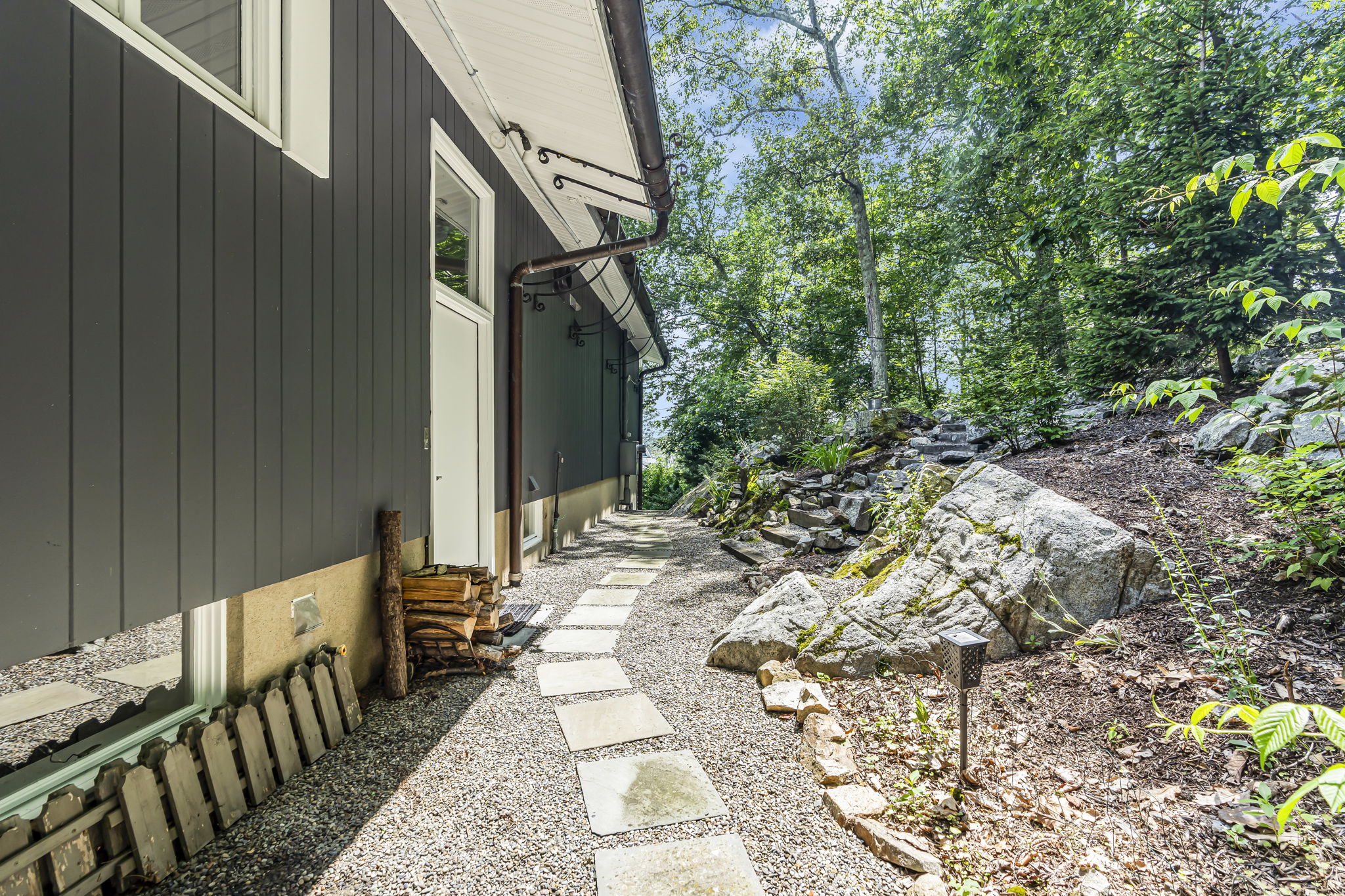Level entry off garage parking to side door foyer