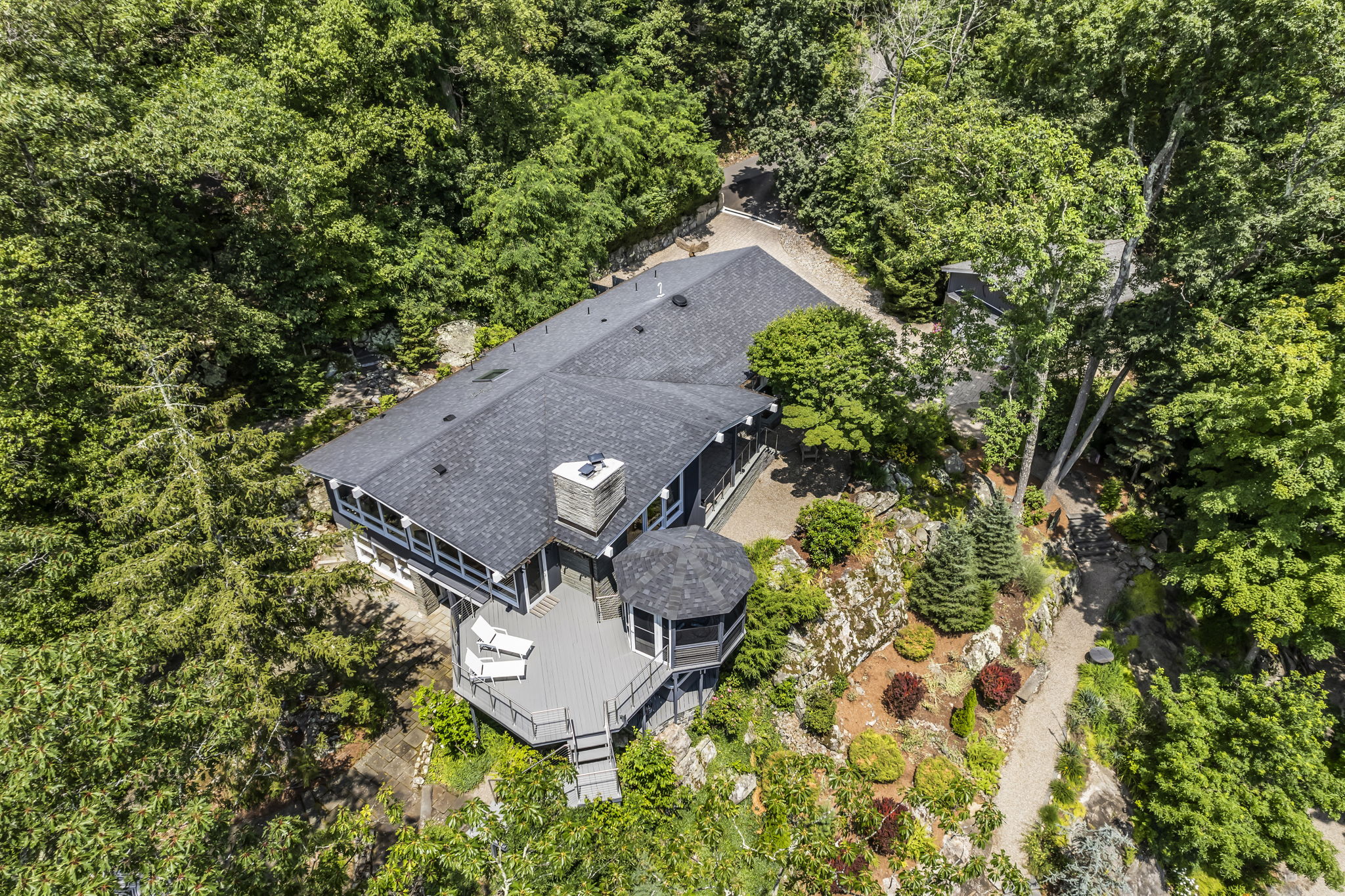 Close up overview, house, deck and cabana