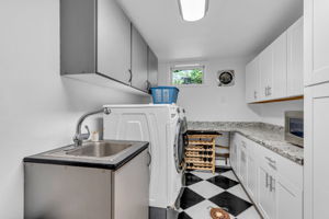 View into laundry room with folding station