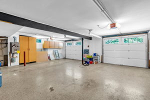 Built-in finished garage, insulated overhead garage door, key less entry