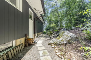 Level entry off garage parking to side door foyer