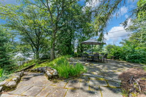 Sprawling patio with casual sitting area