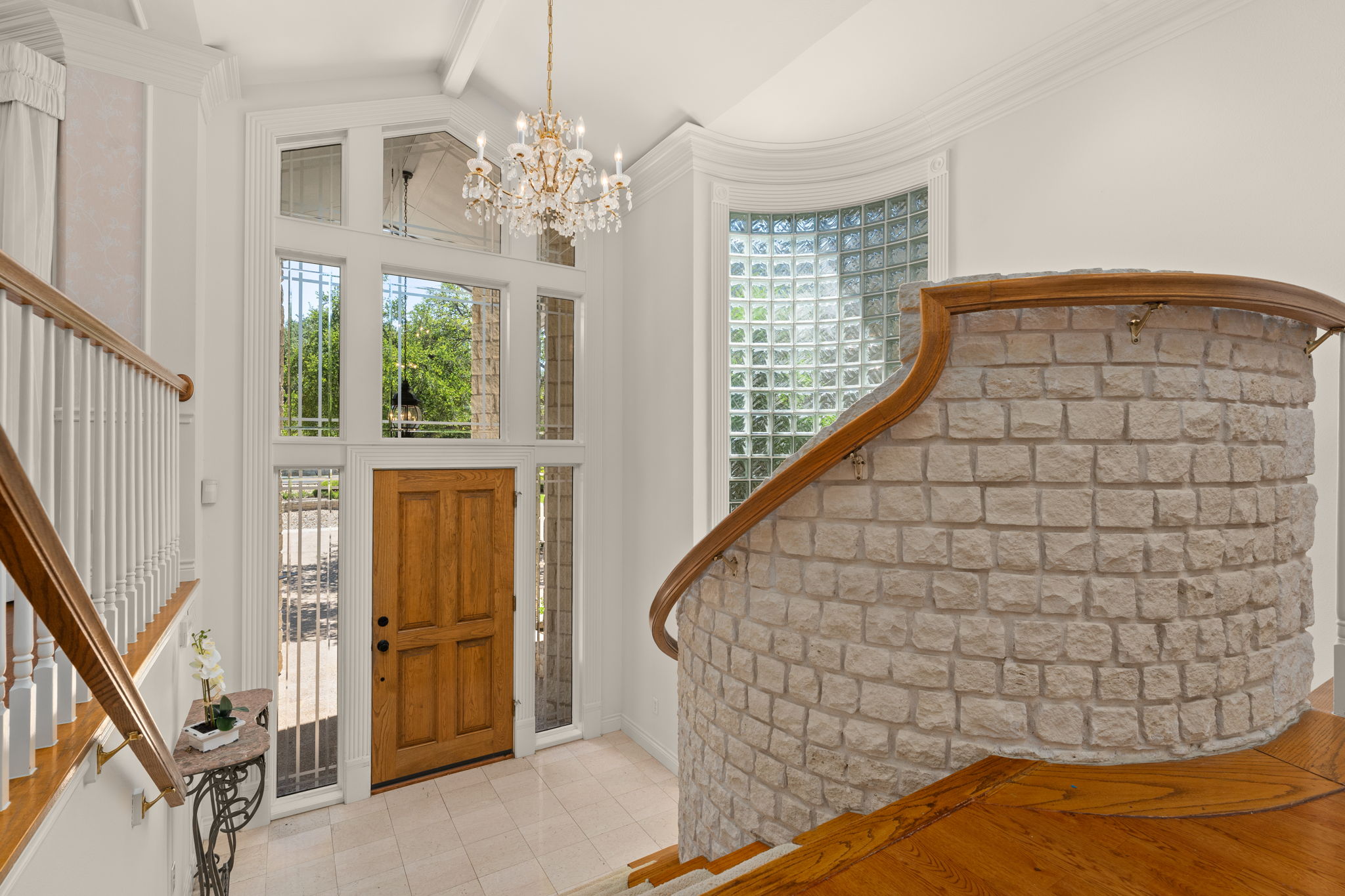 Entry into this home with huge wall of block glass
