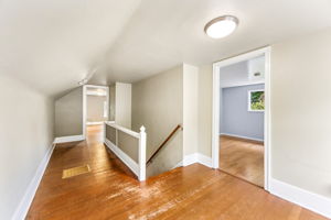 Large landing space upstairs could make a cute little office space or crafting nook.