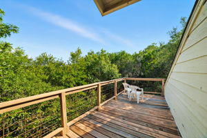 The expansive upstairs back patio offers a private perch among the treetops, creating the perfect spot for morning coffee, evening gatherings, or simply unwinding with a view. Surrounded by nature yet located in Eanes ISD near Lake Austin, it blends relaxation with convenience.
