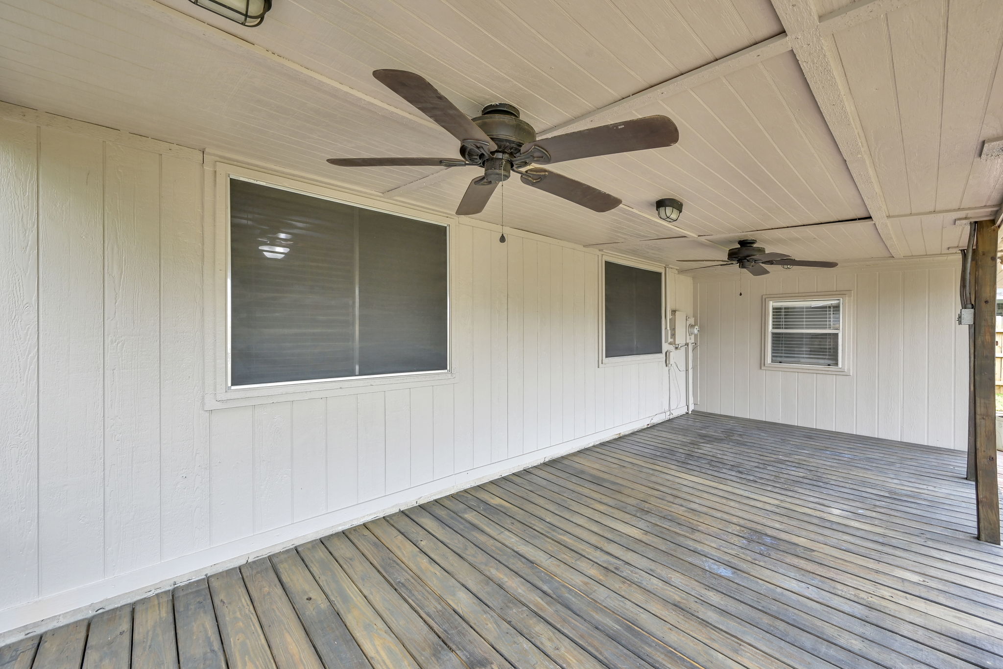 This large COVERED DECKED PORCH area (10' x 24') was added for outside enjoyment by all.