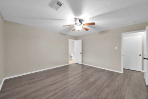 Another view of the PRIMARY BEDROOM (looking out towards the hallway).