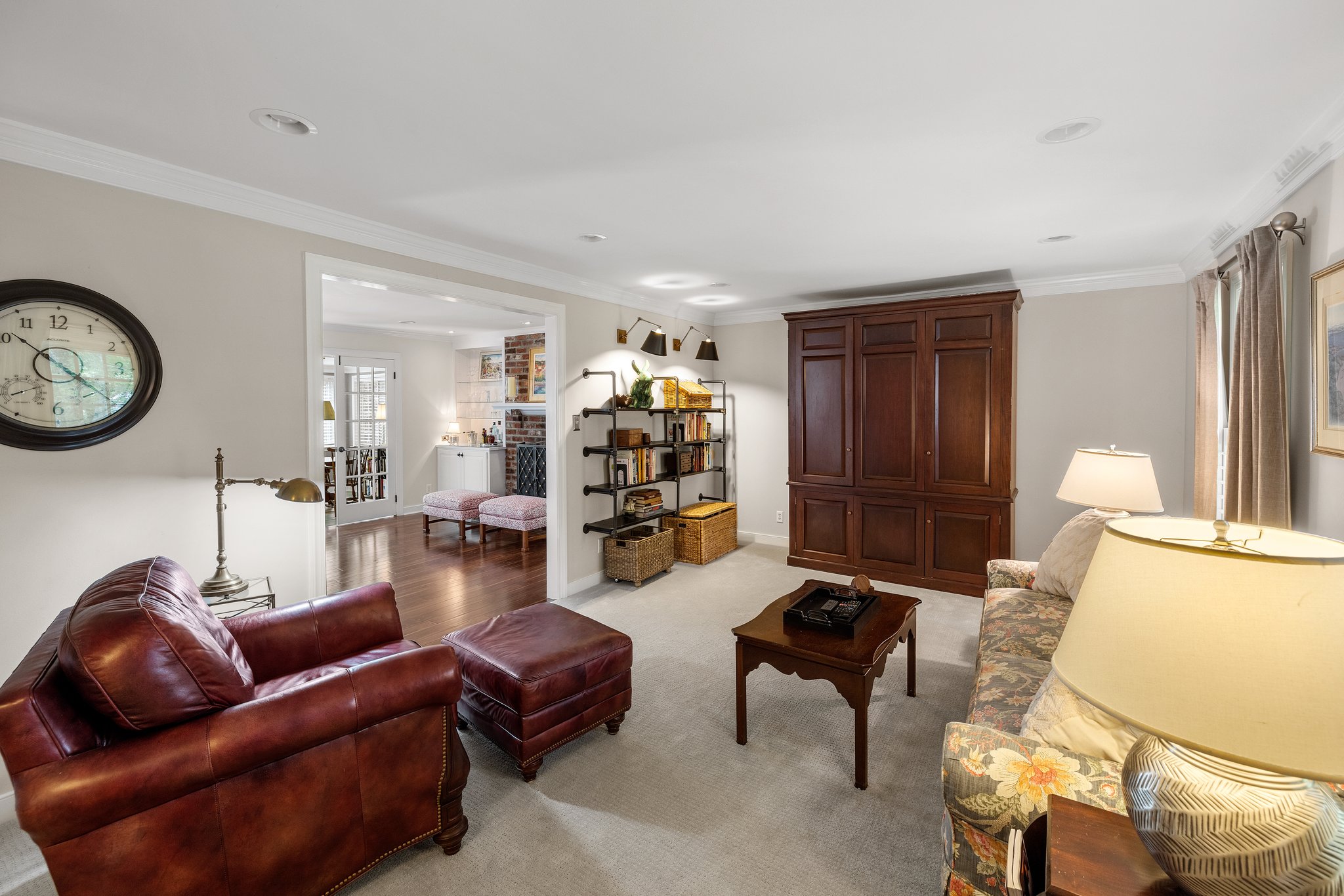 Living room/Den - and Entertainment Center conveys!