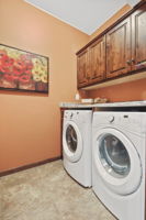Main floor laundry w/Granite countertops