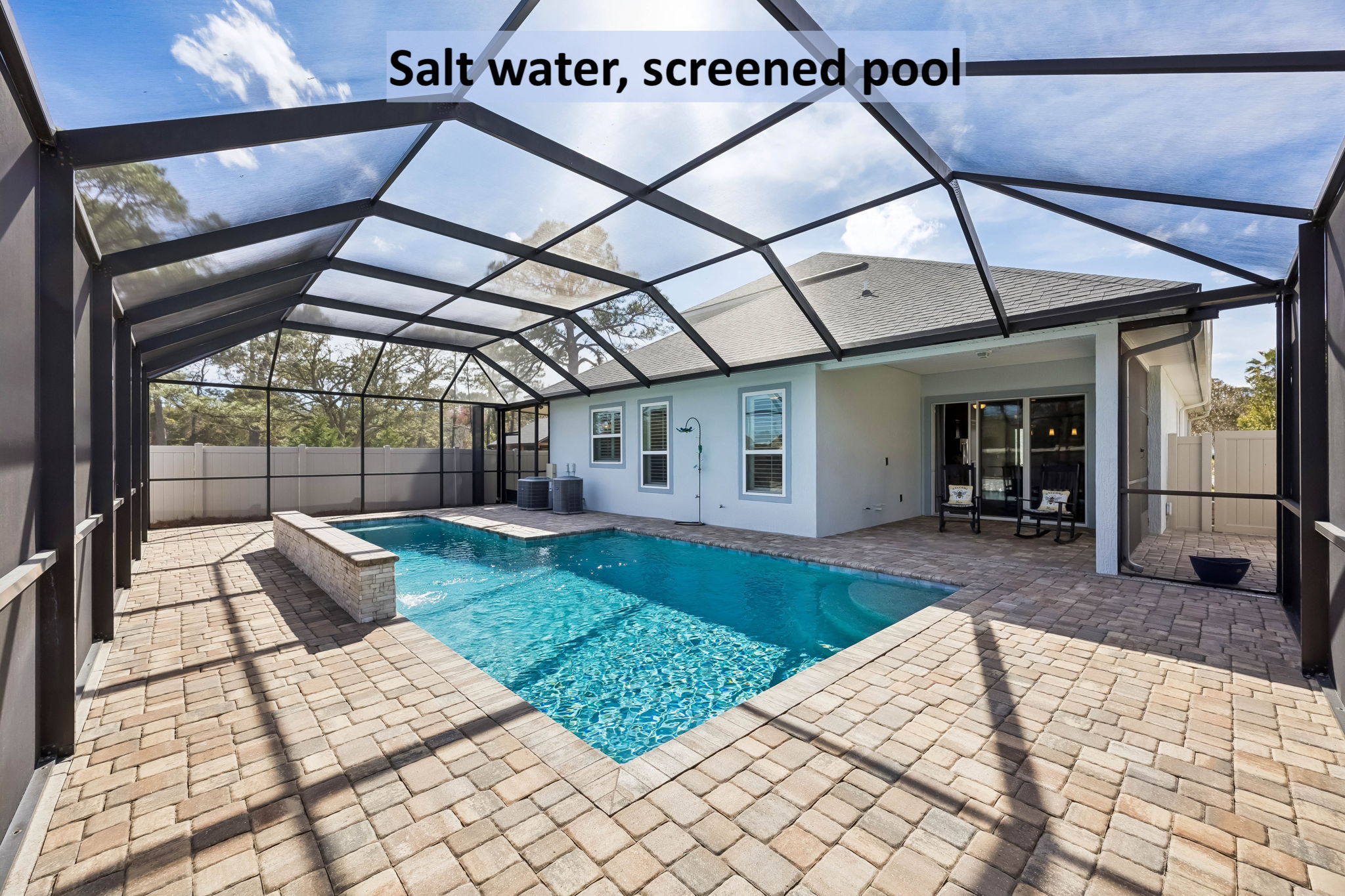 ... beautifully complemented by inviting views of the saltwater pool just beyond