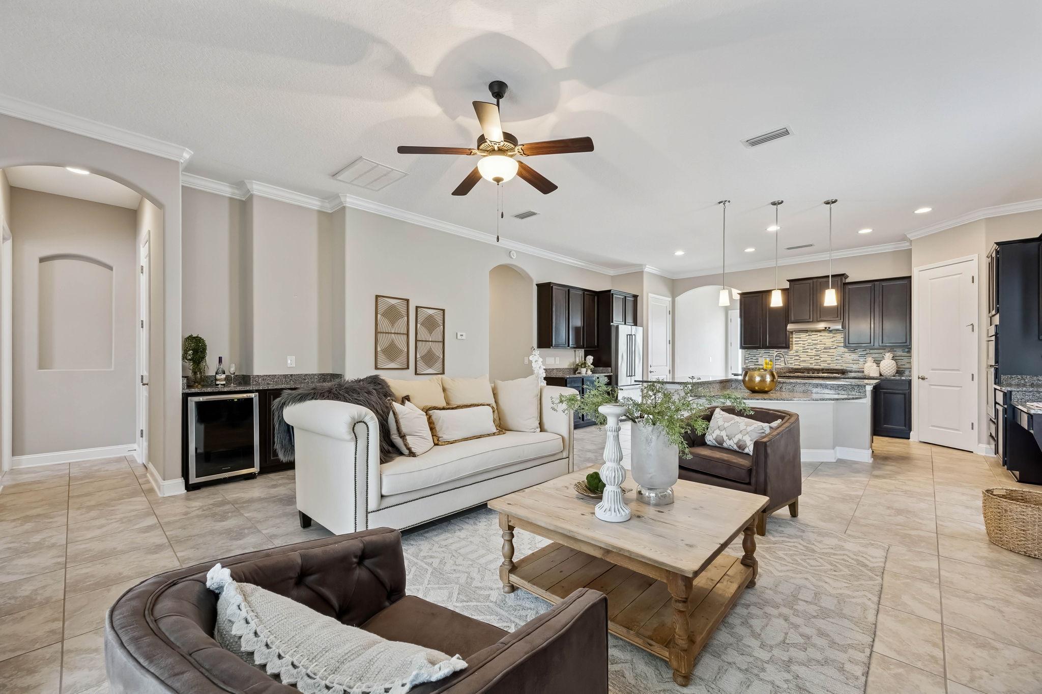 Designed with both comfort and versatility in mind, the living room offers generous proportions that allow the space to breathe ...