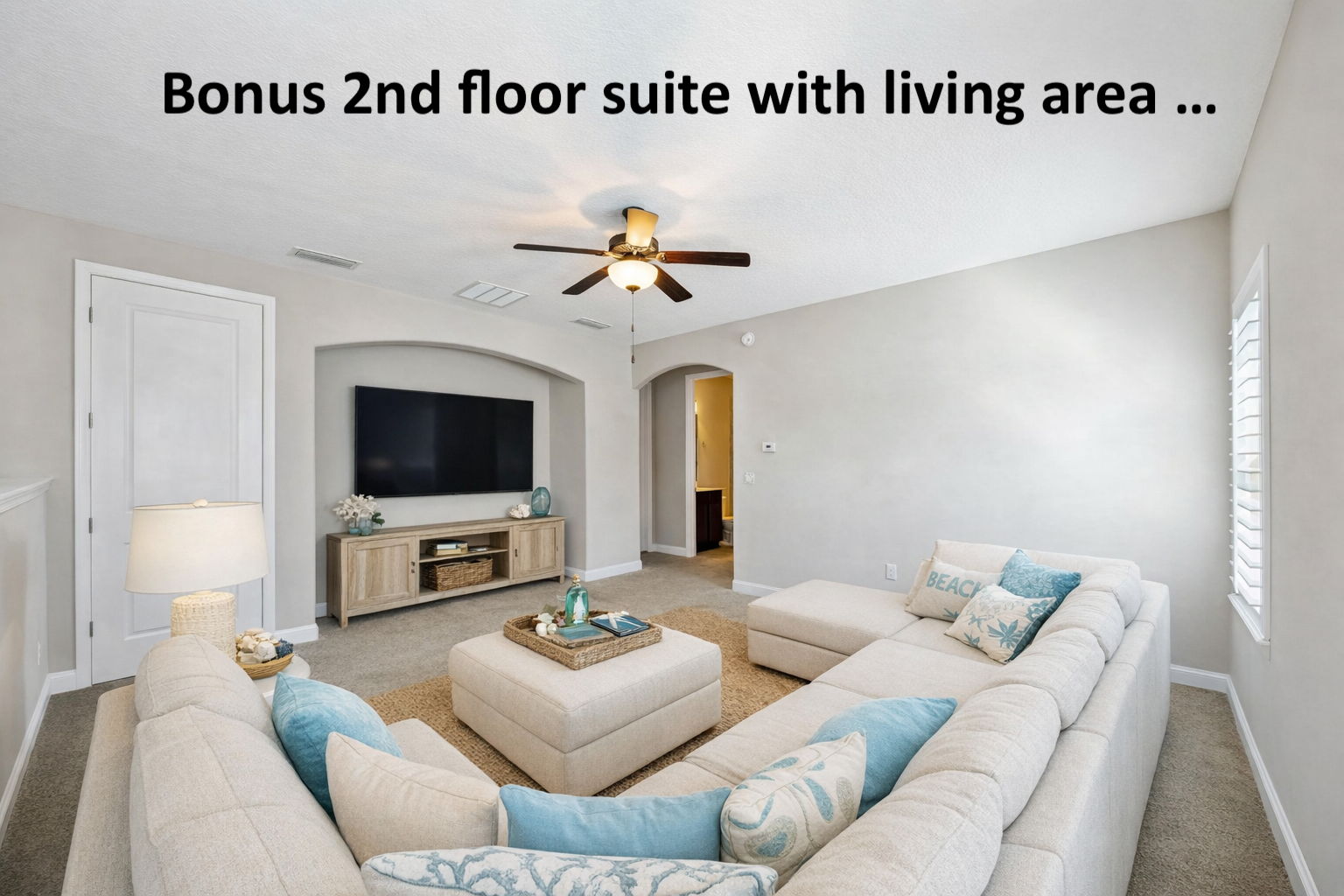 The private second-floor bonus suite begins with its own comfortable living area, creating a flexible retreat away from the main level ...