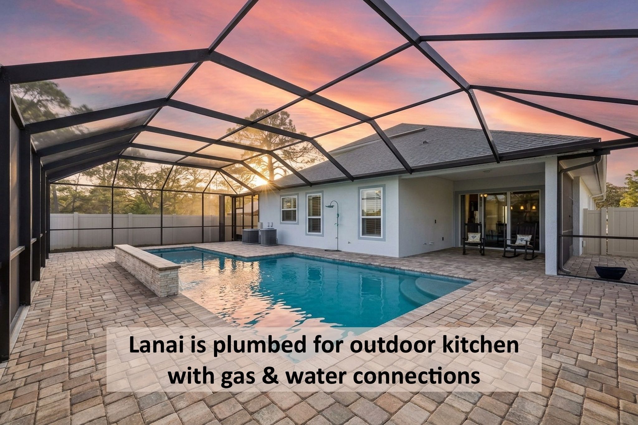 The expansive screened pool area is designed for true Florida living ...