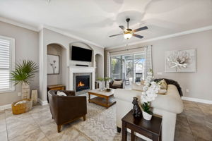 ... with architectural arches, crown molding, and a statement fireplace adding warmth and character