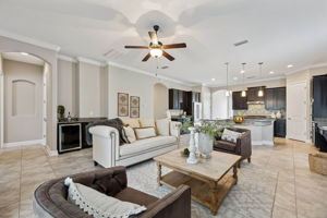 Designed with both comfort and versatility in mind, the living room offers generous proportions that allow the space to breathe ...