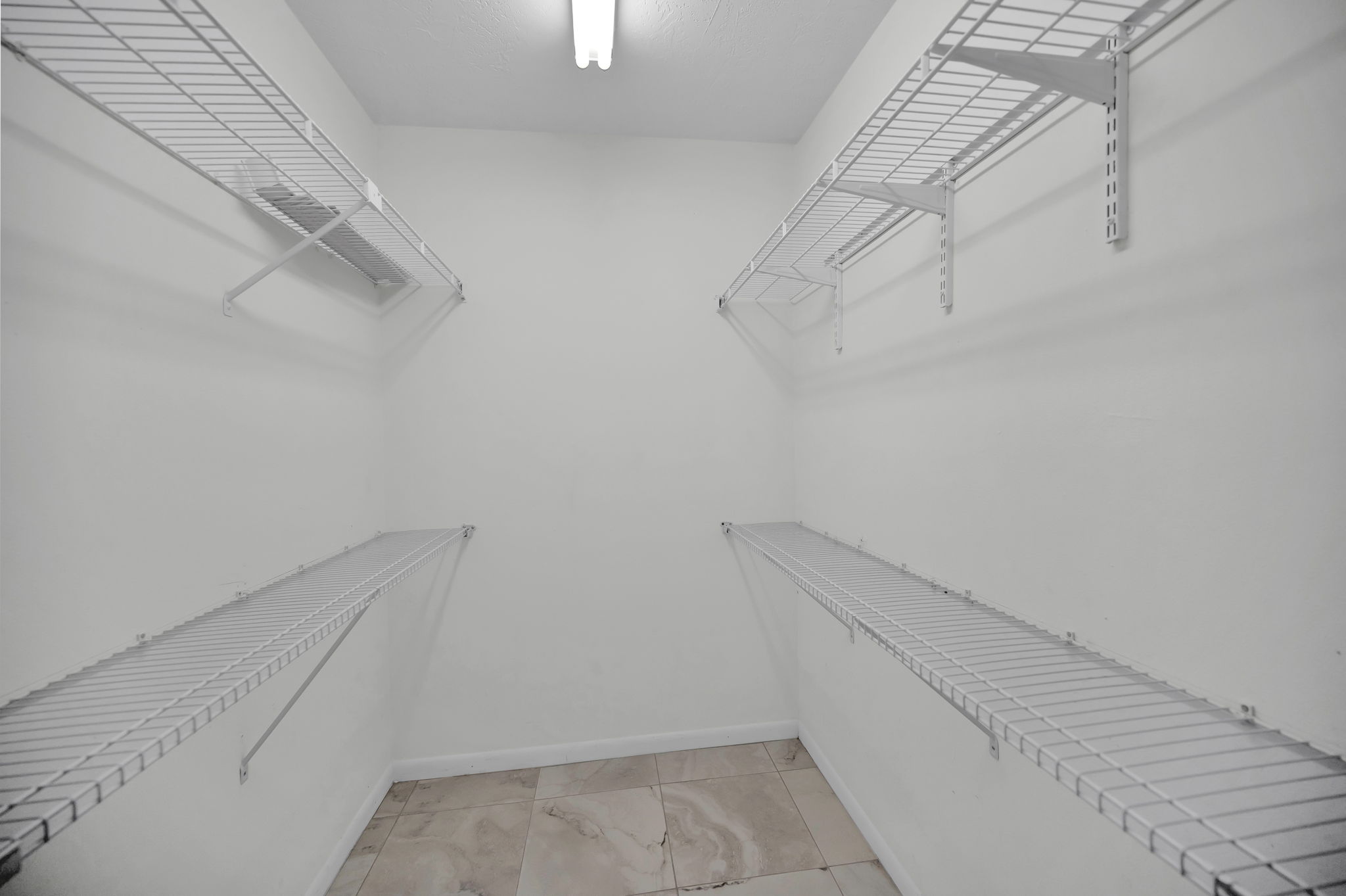 Primary Bedroom Walk-in Closet