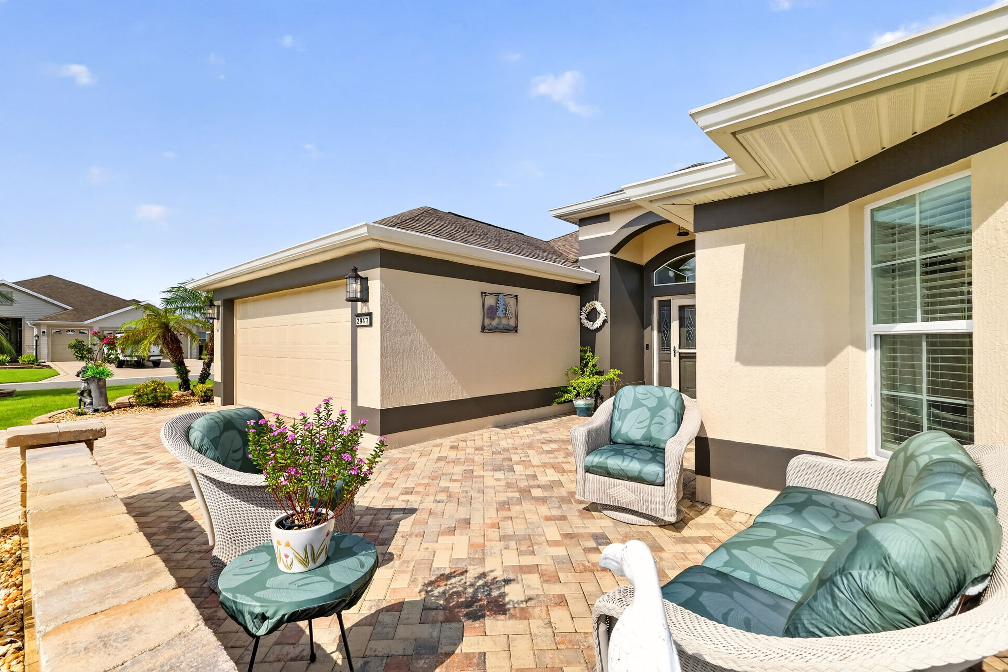 Spacious Front Paver Patio with Knee-High Wall