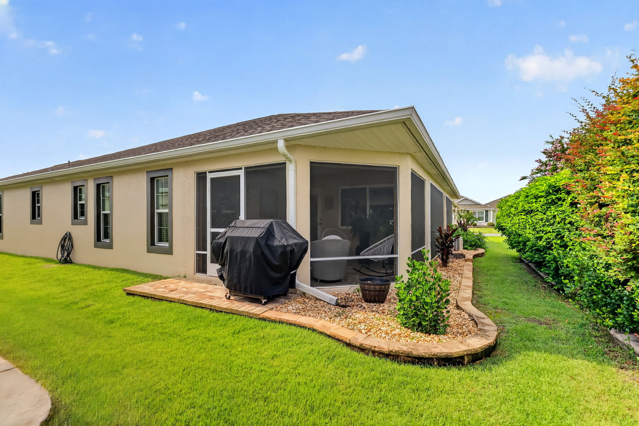 Rear and Side Elevation with Paver Grilling Patio and Mature PRIVACY Landscaping