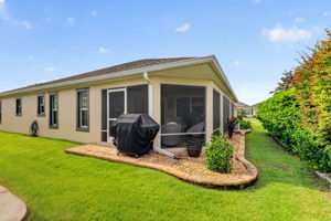 Rear and Side Elevation with Paver Grilling Patio and Mature PRIVACY Landscaping