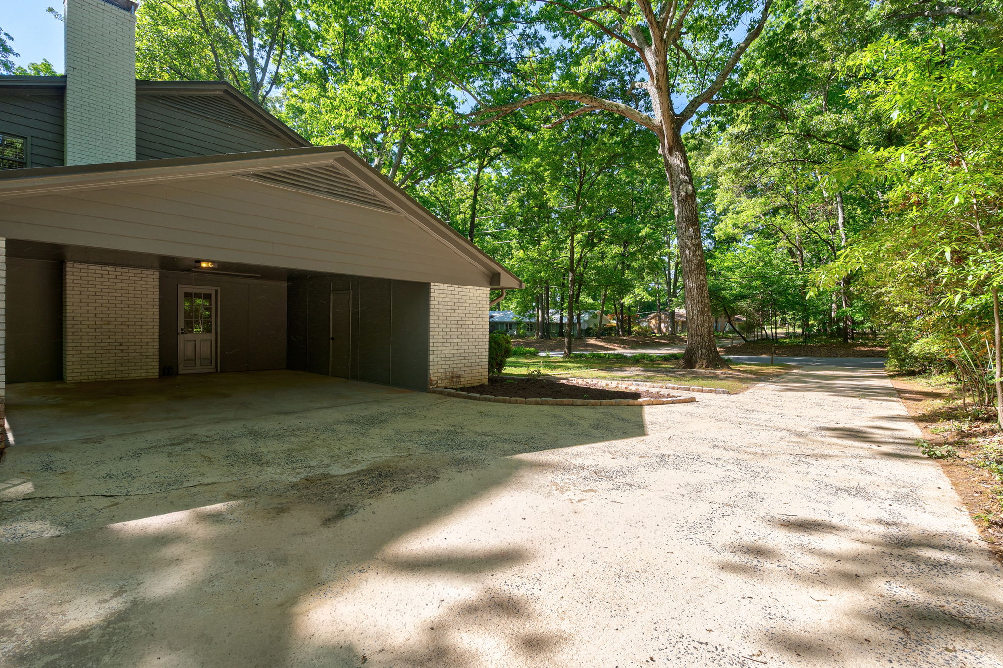 Two Bay Carport + Two Car Parking Pad